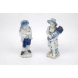 A pair of blue and white German porcelain figures of a boy and a girl from Schmeisser Porzellan