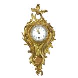 A French gilt metal cartel type clock, 20th century, the case moulded with acanthus leaf