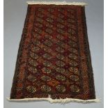 A Turkmen rug, with four rows of Guls, 194cm x 99cm, a Turkish rug, a Turkish runner, a West Persian