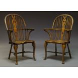 A pair of elm and beech Windsor armchairs, second half 20th Century, each with shaped and pierced