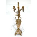 A pair of French Rococo style gilt metal candelabras, late 19th / early 20th century, 63cm high,