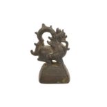 A large Burmese bronze weight, 17th/18th century, 12.5cm high50