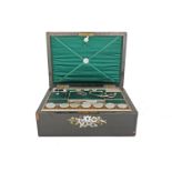 A Victorian ebonised wood and mother of pearl inlaid sewing box, the interior with a pull out try,