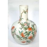 A large Chinese porcelain bottle vase, off recent manufacture, decorated with peach in branches,