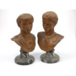A pair of wooden carved busts of Roman emperors, 19th century mounted on wooden bases, 32cm high (