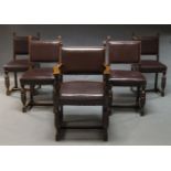 A set of five Jacobean style oak chairs, early 20th Century, upholstered in burgundy vinyl material,