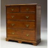 A Victorian chest of drawers, with two short over three long graduated drawers, raised on bracket