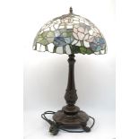 A Tiffany style stained leaded glass lamp, 70cm high, together with a 20th century milk glass and