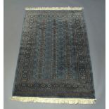 A Pakistan rug of Tekke design, with three rows of guls in a light blue field, 183cm x 123cm80
