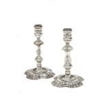 A pair of George II silver candlesticks, London, c.1743, Philip Garden, the shaped, moulded