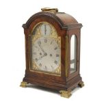 A George III brass mounted mahogany bracket clock, John Thwaites, London, arched brass dial with