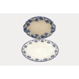 Four large Staffordshire oval shaped meat platters with various blue and white printed patterns of