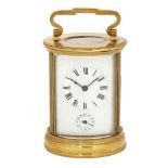 A French brass carriage alarm clock, 20th century, of cylindrical form, the white enamel dial with