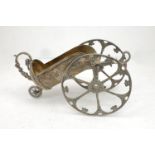 A silver table wine cradle, designed as a cannon, both main wheels and body stamped 925, the