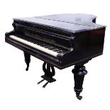 An ebonised baby grand piano by by F Schmid und Kunz, Wien, student of Bosendorfer, late 19th