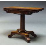 A William IV rosewood card table, the fold over top enclosing green baize lined playing surface,
