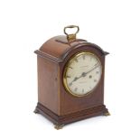 A Victorian mahogany and line inlaid mantel clock by L. Mumford, with brass carrying handle to the