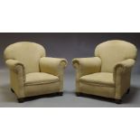 An Edwardian three piece suite, comprising two seater sofa, 74cm high, 135cm wide and two armchairs,