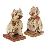 Pair of painted carved wood cats, Rajasthan, India, 19th century, on square bases, 12cm. high (2)50