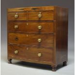 A Regency mahogany bow front chest, with two short over three long graduated drawers on later turned