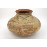 A large Pre-Columbian earthenware vase of bulbous form with flared lip, decorated with geometric
