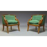 A pair of French Empire style walnut bergère armchairs, late 20th Century, the curved backs above