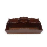 An Edwardian mahogany two-section cutlery tray, with carved pierced bordering and single shaped