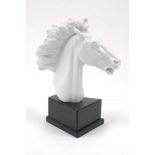 A Meissen blanc de chine model of a horses head, 20th century, signed Erich Oehme 1949, mounted on a