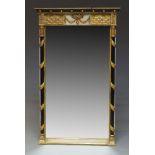 A Regency style grey painted and parcel gilt wall mirror, late 20th Century, the cornice with