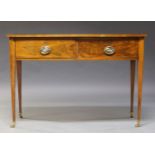 An Edwardian mahogany bowfront side table, with two cockbeaded drawers, raised on square tapering