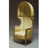 A Louis XVI style giltwood porter's chair, late 19th century, with striped upholstery, ribbon-carved