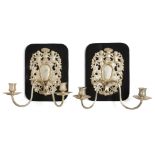 A pair of silver plated two light wall appliques, in the 17th century taste, 20th century, the