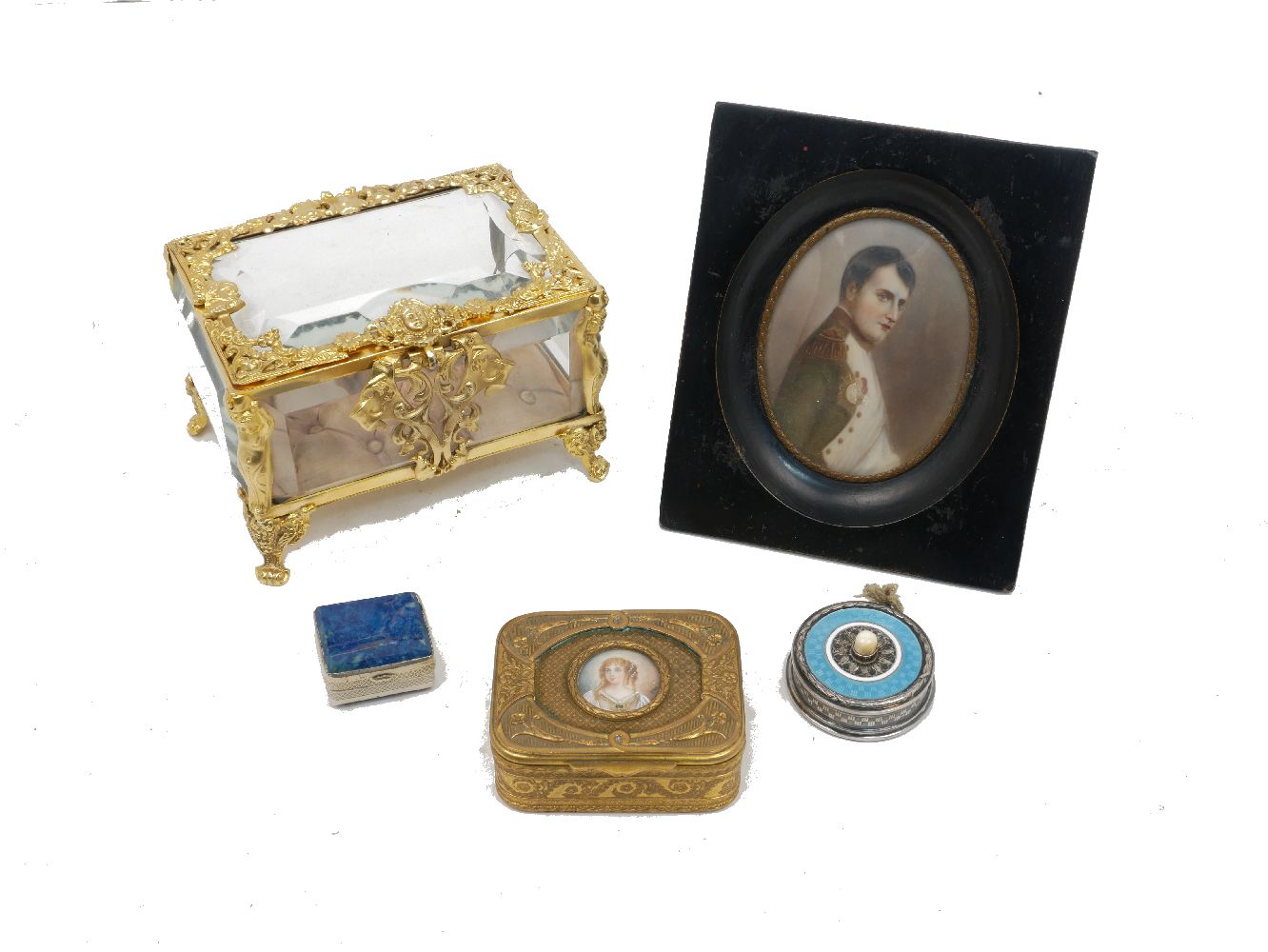 A miniature painting of Napoleon, early 20th century, in a black wood frame, 14 x 12cm, together