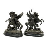 A pair of early 20th century spelter figurines of Marley Horses with depictions of Poseidon and
