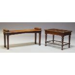 A Victorian mahogany hall bench, the rectangular seat with shaped bolster handles, raised on