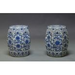 A pair of Chinese blue and white hexagonal garden seats, 18th century style, decorated with