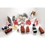 A collection of Beswick pottery cattle to comprise two bull, two calves, four milk cows, together