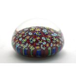 A large Italian Murano glass paperweight, mid/late 20th century, inset to clear glass with white