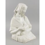 A Continental white glazed ceramic model of a young lady feeding her baby, early 20th century,