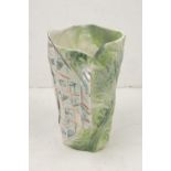 Carol McNicoll (1943-), an Axis Pottery jug c.1990, stamped marks to base A tall moulded jug painted