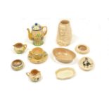 A collection of Ashtead pottery to comprise a four piece Bachelors spring flower tea service, a