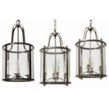A pair of chromed four light ceiling lanterns c.2000 Of cylindrical form with glass panels; together
