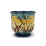 A large Moorcroft reeds at sunset pattern jardinere, impressed mark to base.Please refer to