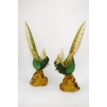 A pair of Italian glass birds, 20th century, the bird with a green body yellow wings and a long