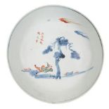 A rare Chinese porcelain kosometsuke wucai dish, Tianqi period, decorated with a boy sleeping