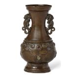 A Chinese bronze gem-set vase, Ming dynasty, 17th century, with finely cast mythical beast