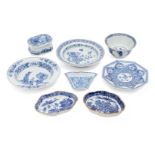 Eight pieces of Chinese porcelain, 17th - 18th century, painted in underglaze blue, comprising a