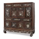 A Chinese hardwood and mother-of-pearl inlaid table top cabinet, 19th century, with arrangement of