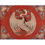 A pair of Chinese silk embroidered panels, 19th century, decorated with red-crested crane roundels