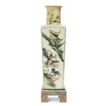 A Chinese porcelain square vase and stand, 19th century, painted in famille verte enamels with